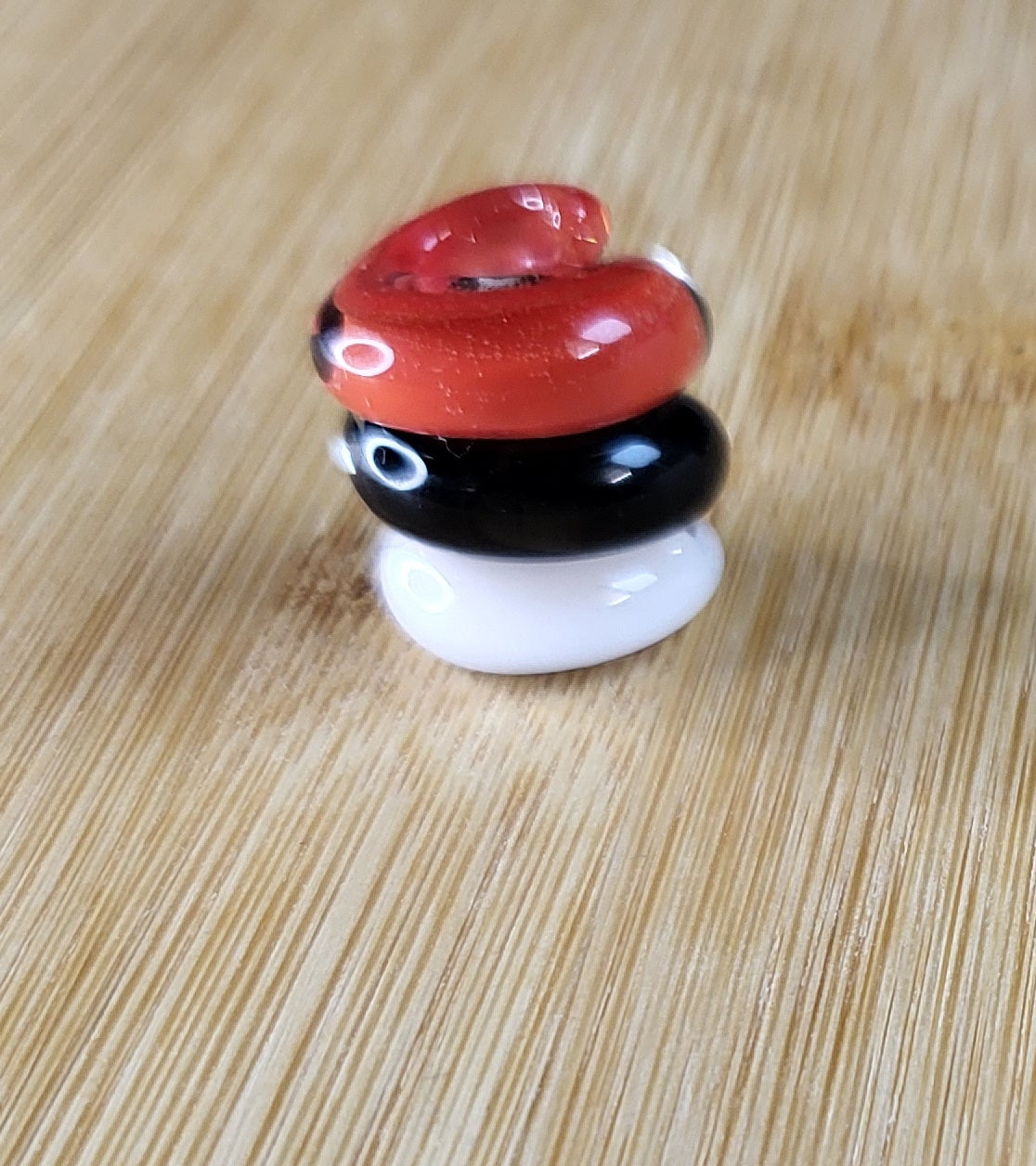 Red, Black And White Coil Glass Loc Bead